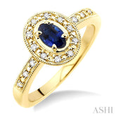 5x3 MM oval cut Sapphire and 1/10 Ctw Single Cut Diamond Ring in 14K Yellow Gold.